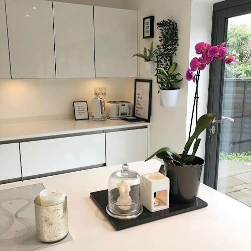 Can’t beat an orchid for a pop of colour. Love how it stands out against the white kitchen. 

I love our kitchen but next house we have I think I’ll go for more of a traditional shaker style kitchen. 

Have you changed your style at all? 

❤️Welcome to the week 27 home tour of #UKGorgeousHomes

Come join us to discover beautiful homes. You will be inspired !

PARTICIPATING IS EASY! 
1. Follow All Hosts
my_kids_home
the_homely_newbuild
ourhouseat27
VIP host: home_at_27x

2. Follow the hashtag #UKGorgeousHomesTour27l
3. DM a host to join the Tour & start seeing beautiful homes

#UKgorgeoushomes Tour runs weekly at Monday 7:30pm with 24 hours to post
 
You then have an extra hour and a half to engage, and must complete engagement by 9:00pm Tuesday

Happy touring 💕
#UKgorgeoushomes
#UKgorgeoushomestour27l

#mymagnetkitchen #whitekitchencabinets #whitekitchen #howparentshome #YHlovemyhome #yourhomemagazine #neutraldecor #neutralabodes #neutralhomeedit #livingroomdecor #livingroominspo #ukhomeinspo #stalbanslife #stalbansmums