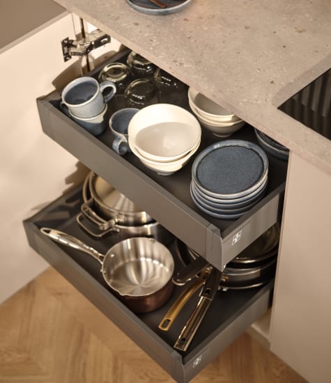 White kitchen cabinet with open shelves and light gray countertop. Reflection | HTH
