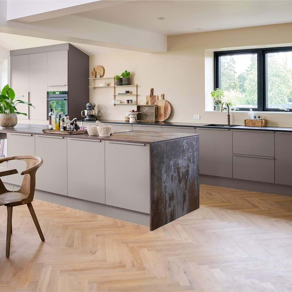 Contemporary kitchen featuring gray cabinetry, wooden details, and expansive windows | HTH