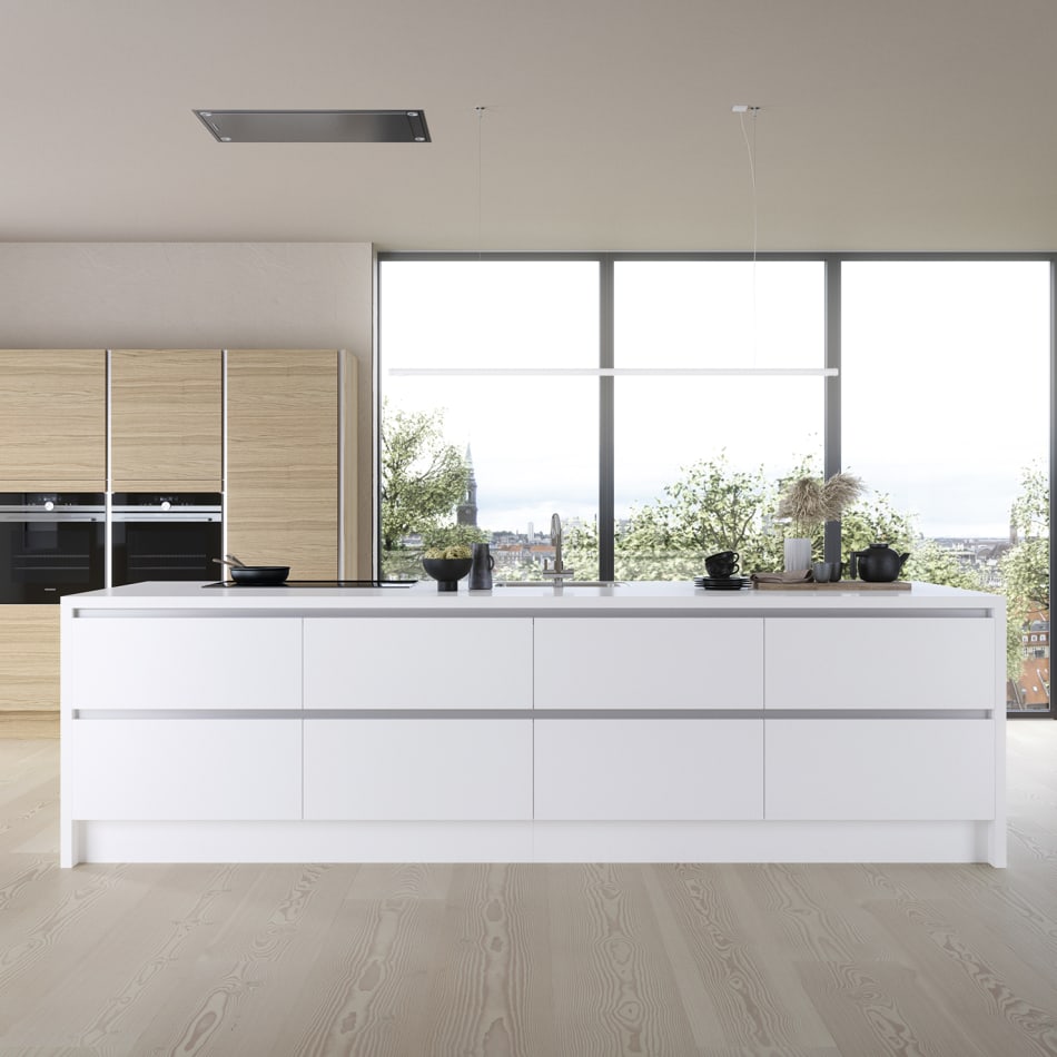 White kitchen island with light wood cabinets and floor-to-ceiling windows | HTH