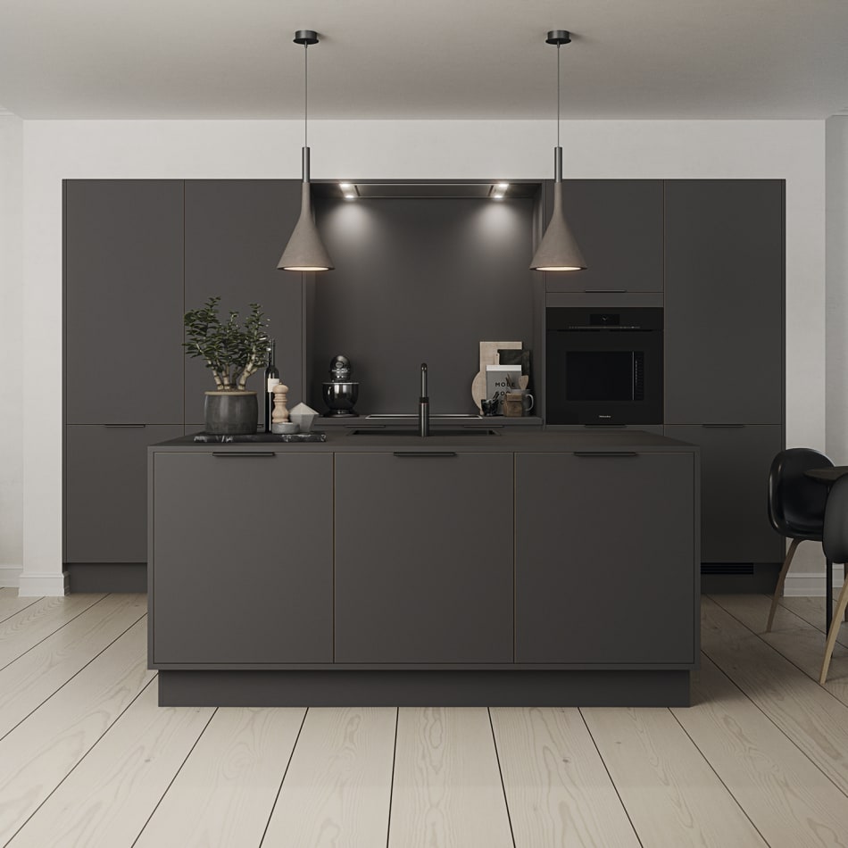 Dark gray kitchen with kitchen island and light wood floor. Focus | HTH