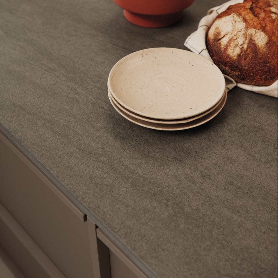 Gray countertop with beige cabinets and integrated handles. Nordic Atmosphere | HTH