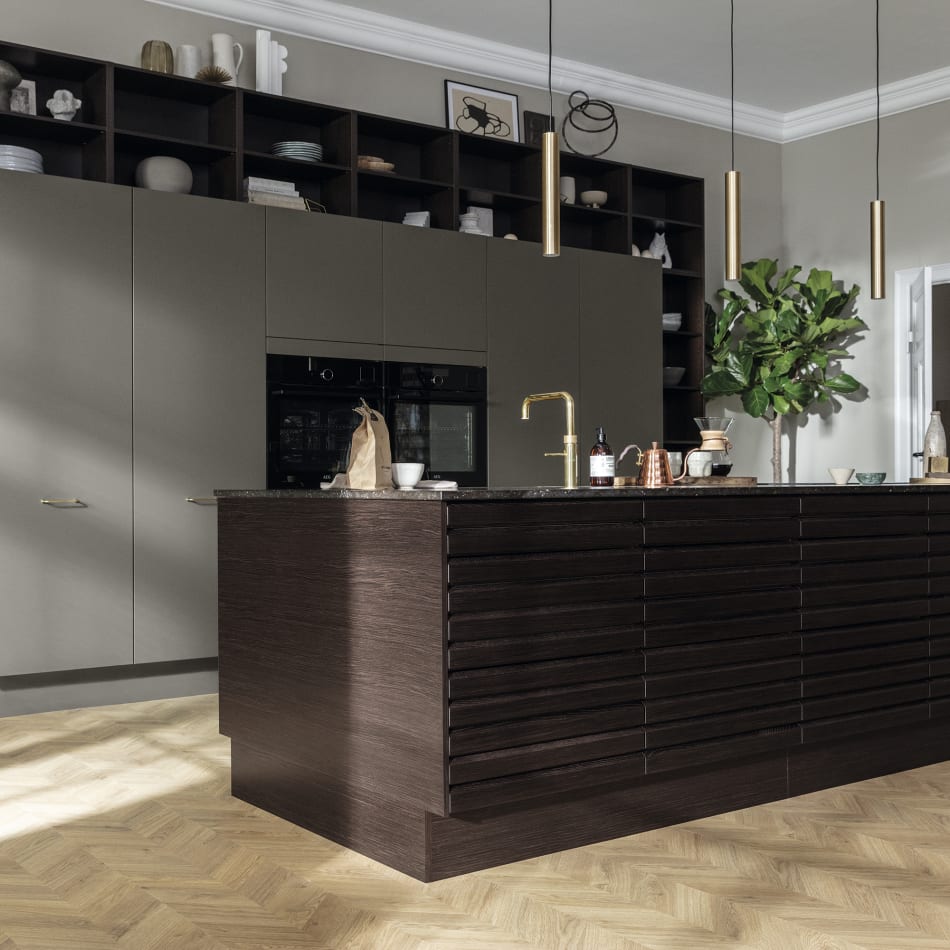 Dark wood kitchen kitchen island with brass faucet and gray cabinets. Nordic Spirit | HTH