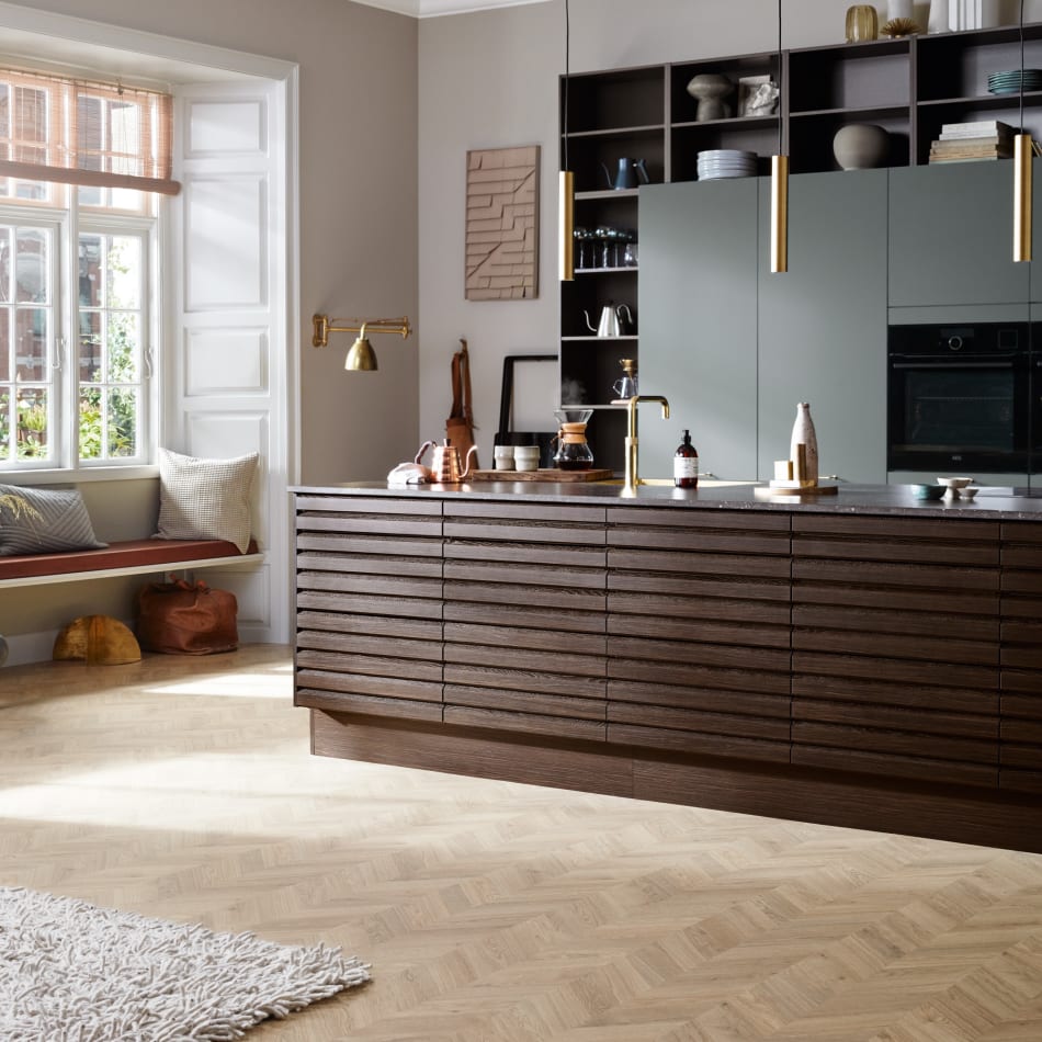 Dark wood kitchen with light wood floor and black countertop. Nordic Spirit | HTH