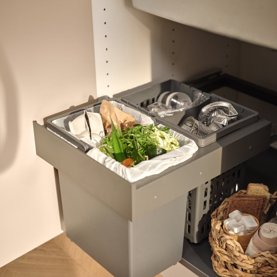 Gray kitchen waste bin with compartments inside a cabinet. Reflection | HTH