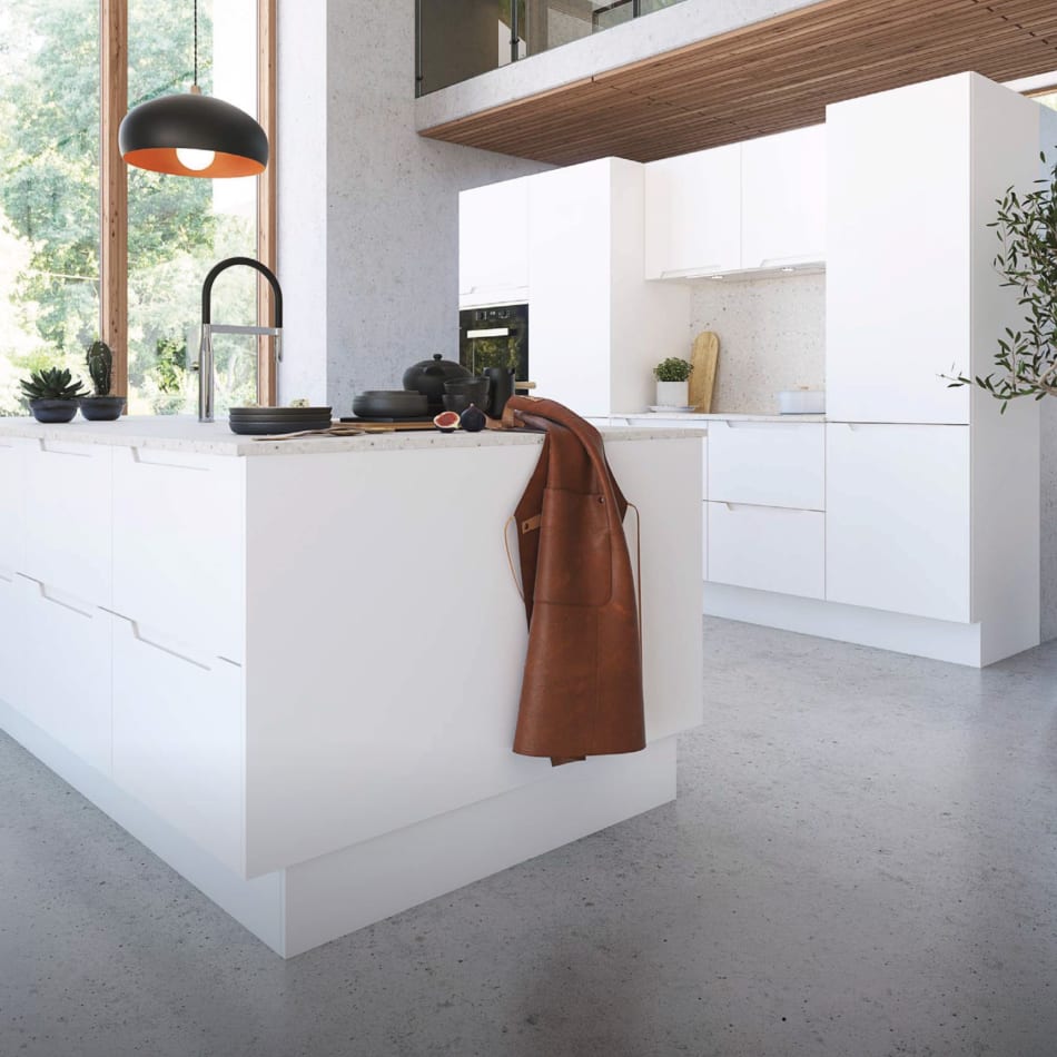 White kitchen with kitchen island and black faucet. Tendens Kitchen | HTH