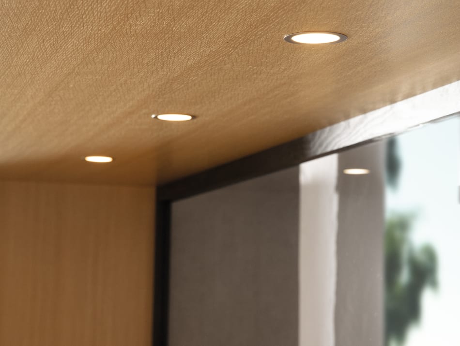 Wooden kitchen cabinet with built-in spotlights. Nordic Creation | HTH