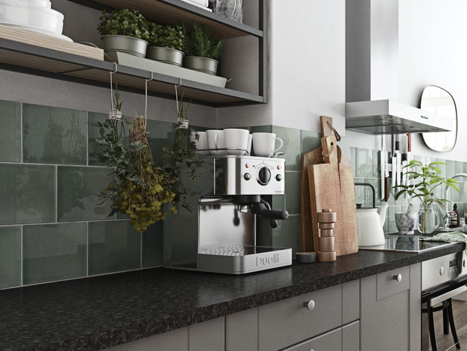 Gray kitchen cabinets with dark countertop and green tile backsplash. Grey Kitchen | HTH